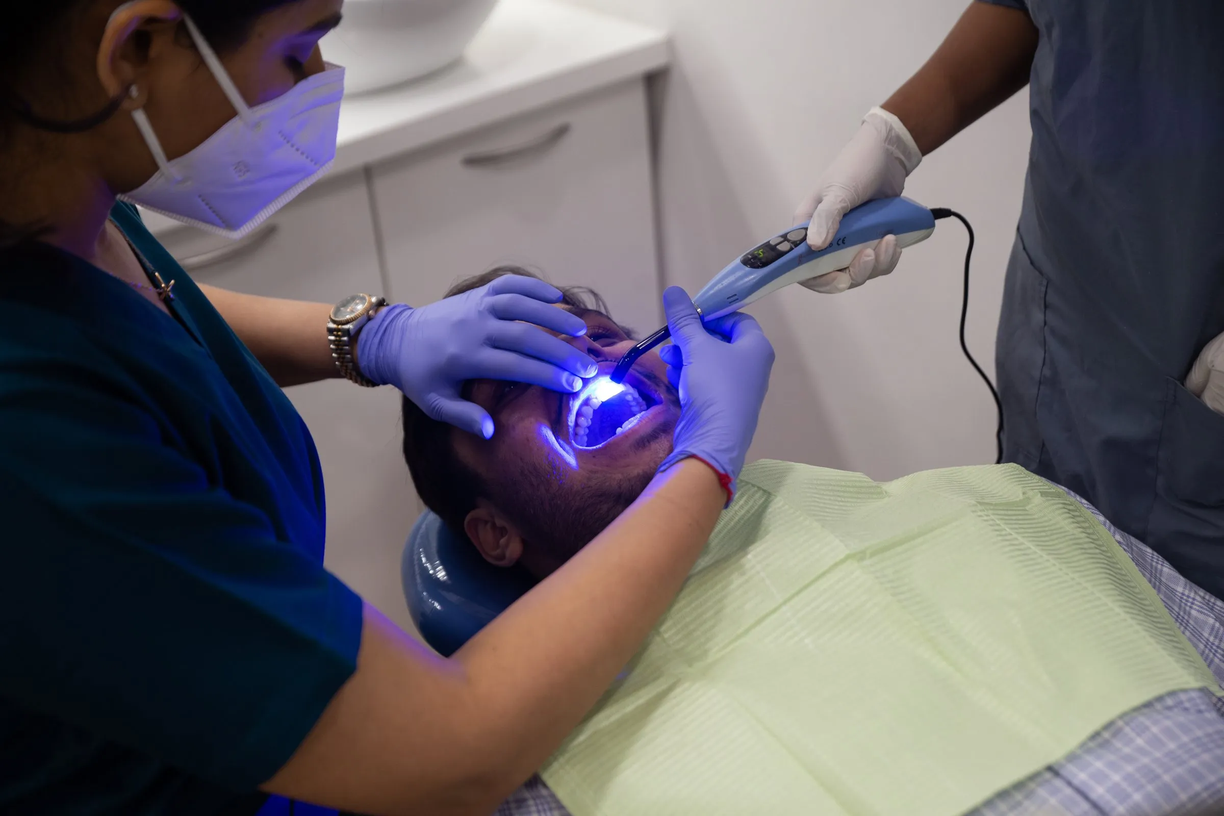 In-clinic teeth whitening with a curing light at i-Smile Dental Clinic, Ghatkopar East